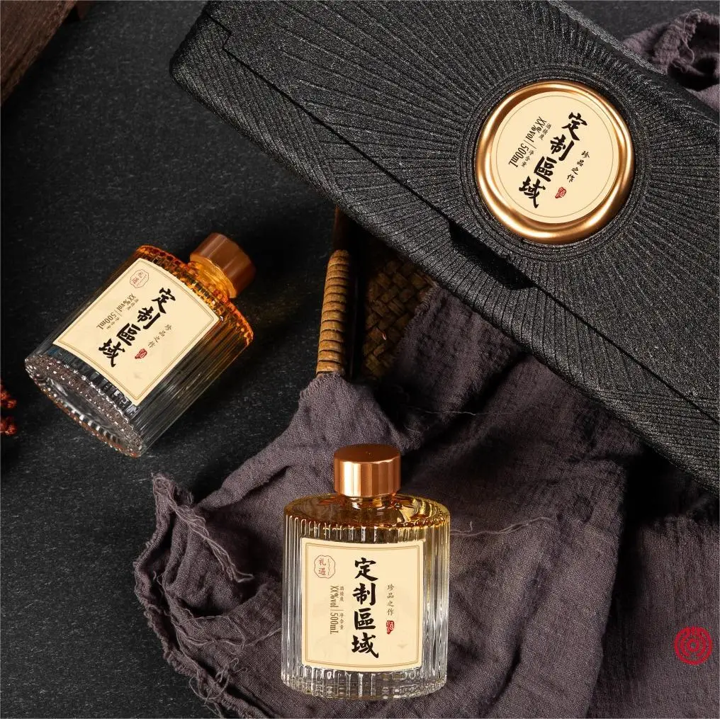 Mini glass alcohol bottle for a branded discovery set