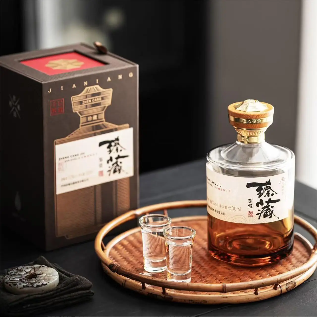Short cylindrical custom glass liquor bottle