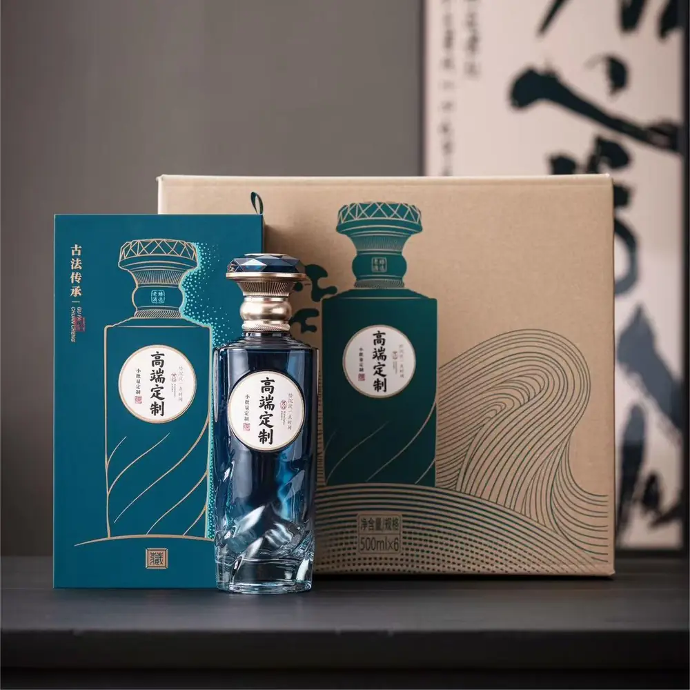 Shang Art G19 blue-tinted glass liquor bottle displayed with coordinating presentation boxes